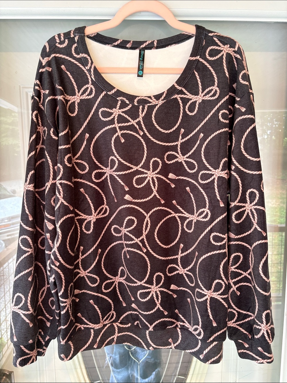 Women's Black Long-Sleeve Top with Pink Rope Print